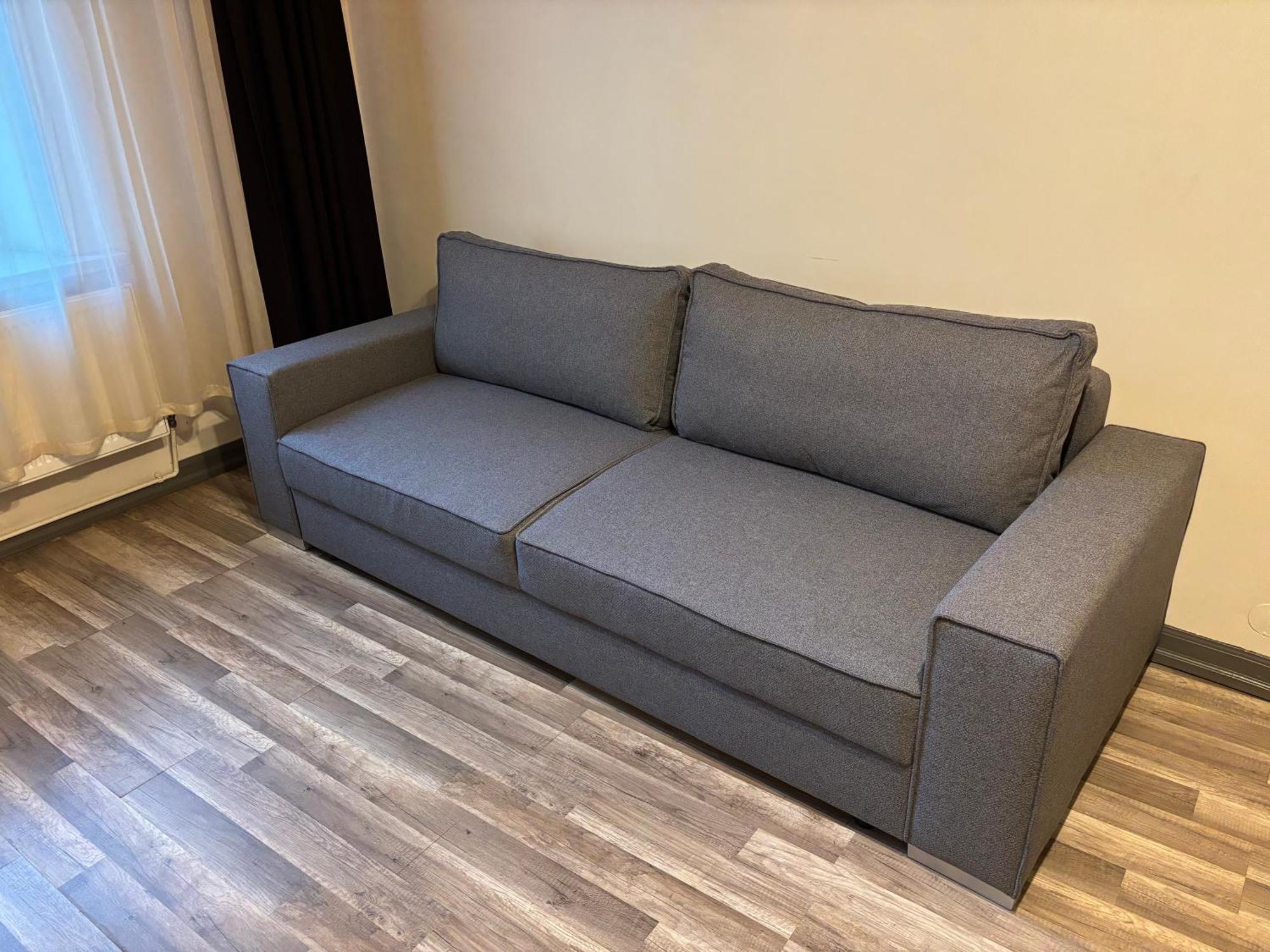 Aparthotel Riga Luaran gambar A sofa