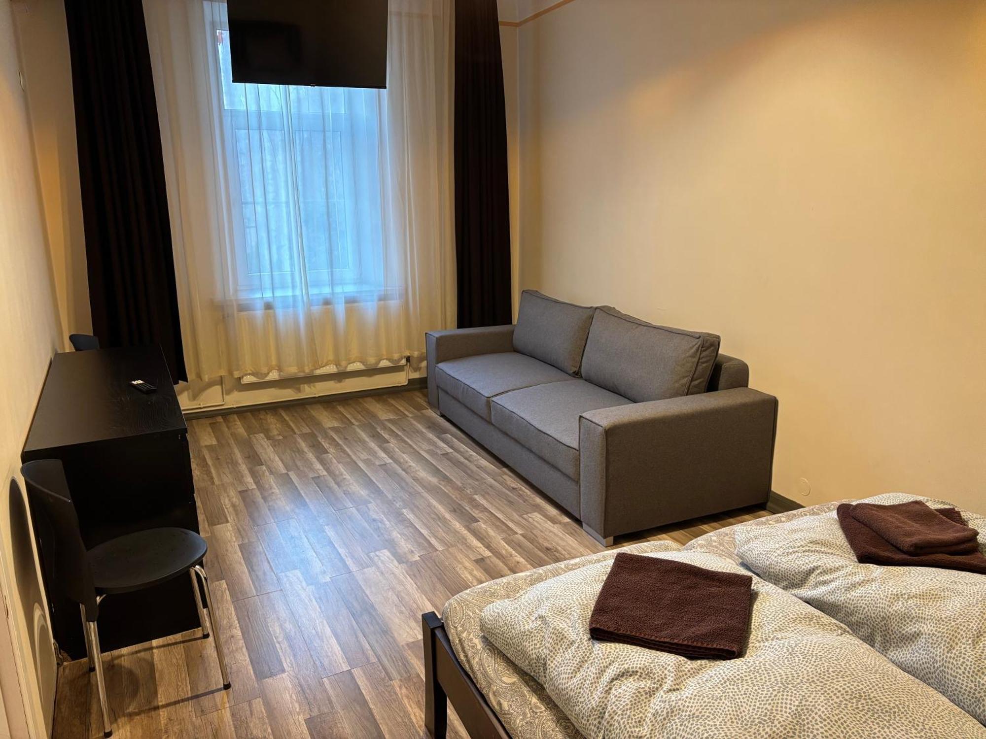 Aparthotel Riga Luaran gambar A typical room at the hostel