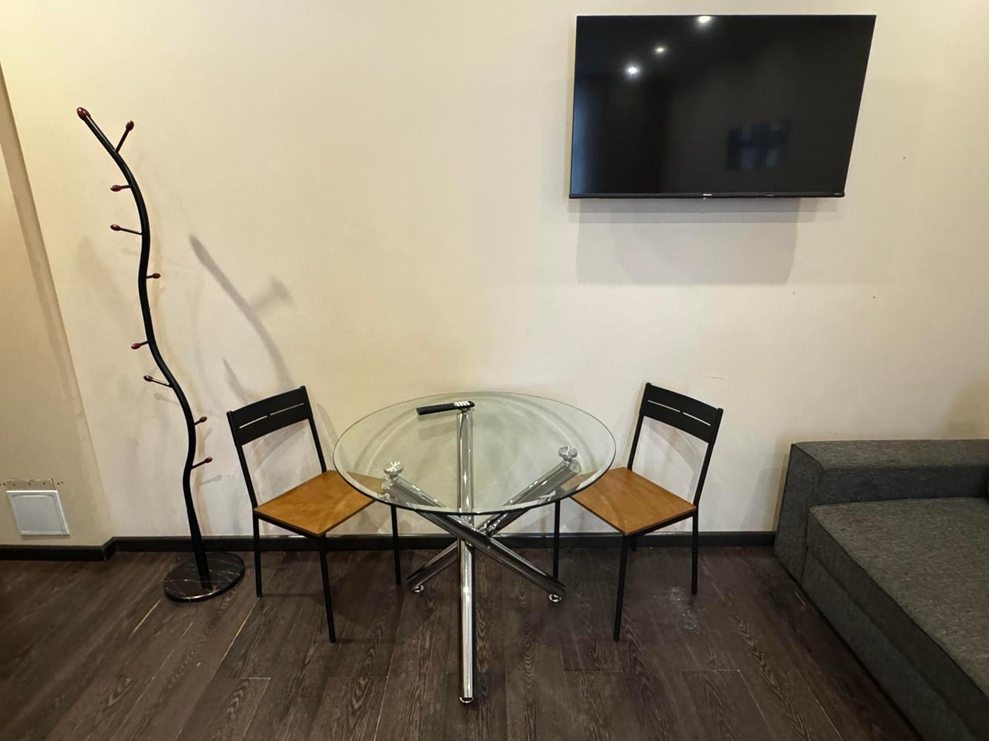 Aparthotel Riga Luaran gambar A coat rack
