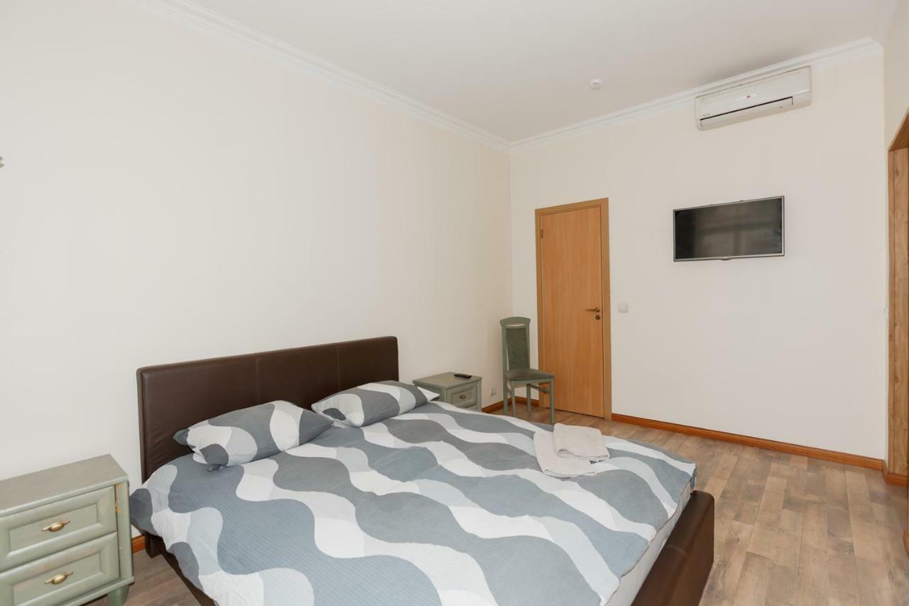 Aparthotel Riga Luaran gambar A bedroom in a hotel